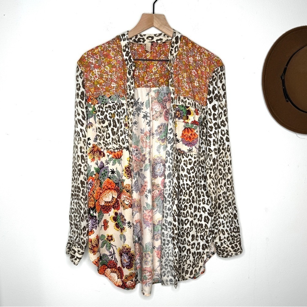 Anthropologie Multi pattern oversized tunic top. Neru neck, long sleeve shirt
